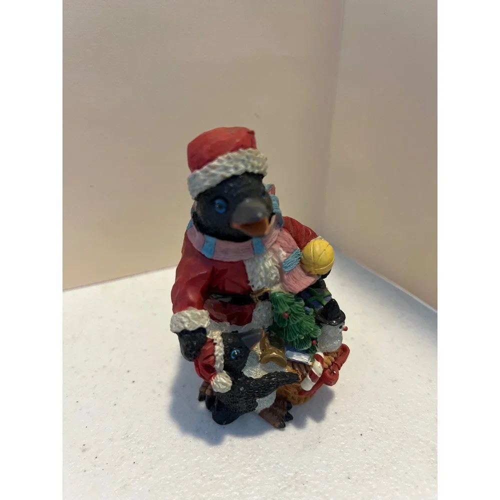 Christmas Santa Penguin Figurine with Baby Penguin and Holiday Sack Resin Decor